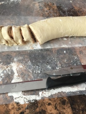 Cut the dough into 1 inch slices for your homemade cinnamon rolls