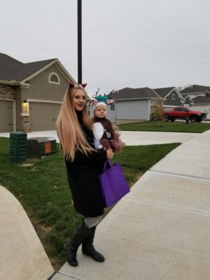 Emmy in her deer costume for Halloween going trick or treating